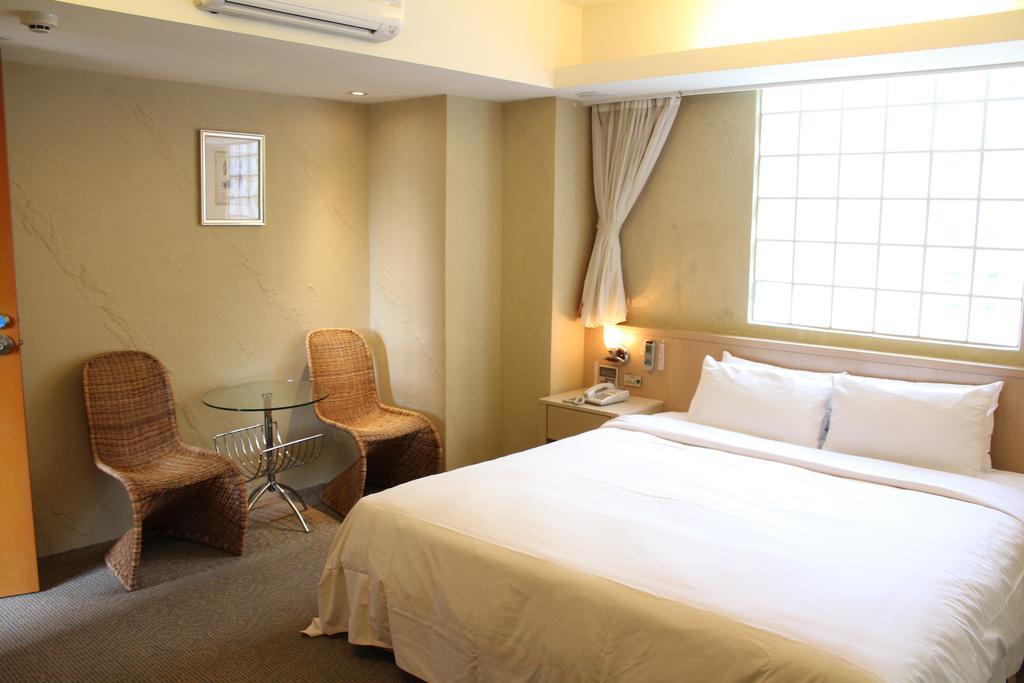 Blue Ocean Hotel Цзілун Номер фото